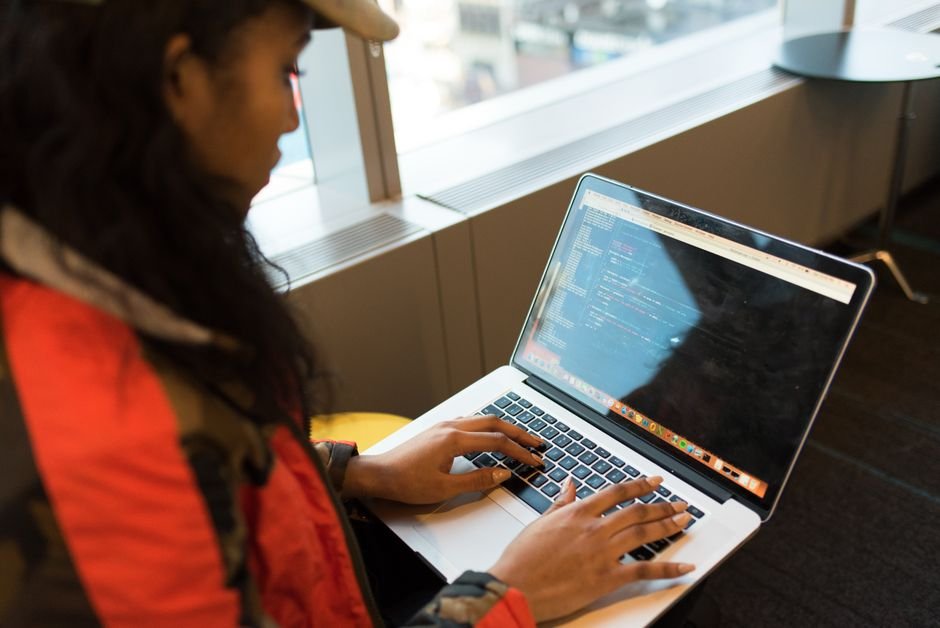 Free WordPress Caching Plugins - Programmer Coding Laptop Workspace Overview
